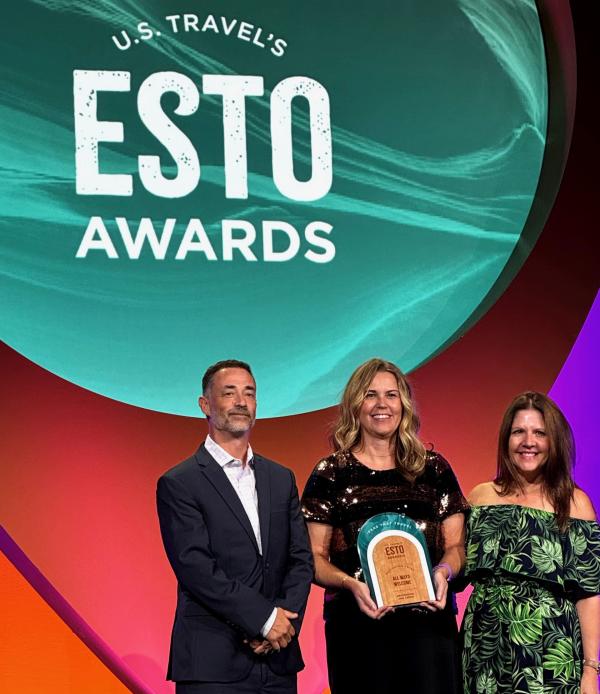 Destination Ann Arbor leadership team accepts the U.S. Travel Association’s “All Ways Welcome” Award at the 2025 ESTO Conference