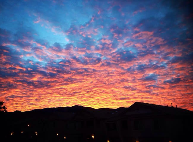 Albuquerque sunrise over the Sandias courtesy of Alison Forrester