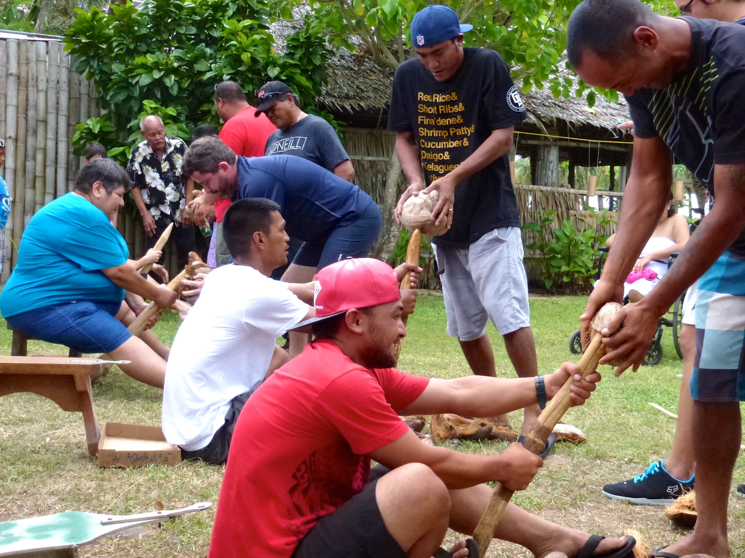 The coconut husking contest is one of many games held during the festival