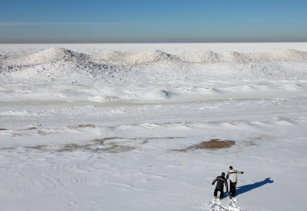 People come to the Indiana Dunes to cross-country ski and view the mountains of ice that form along Lake Michigan.