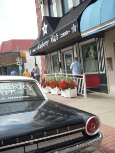 Barney's squad car sits in front of Mayberry Café.
