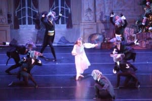 Clara surrounded by mice in Fort Wayne Ballet's The Nutcracker