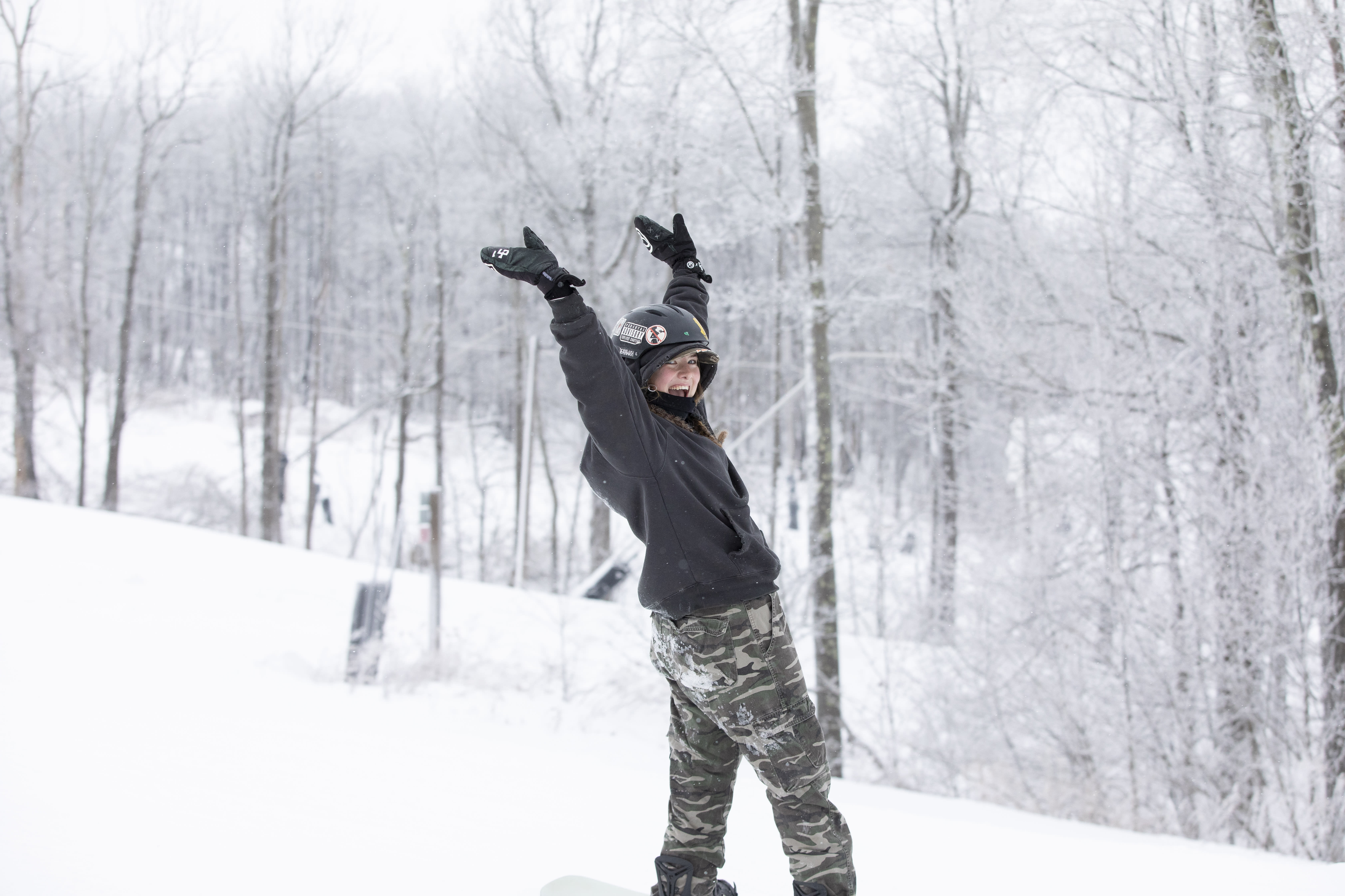 A snowboarder enjoys an early run at Seven Springs Mountain Resort on Friday, Dec. 6, 2024.