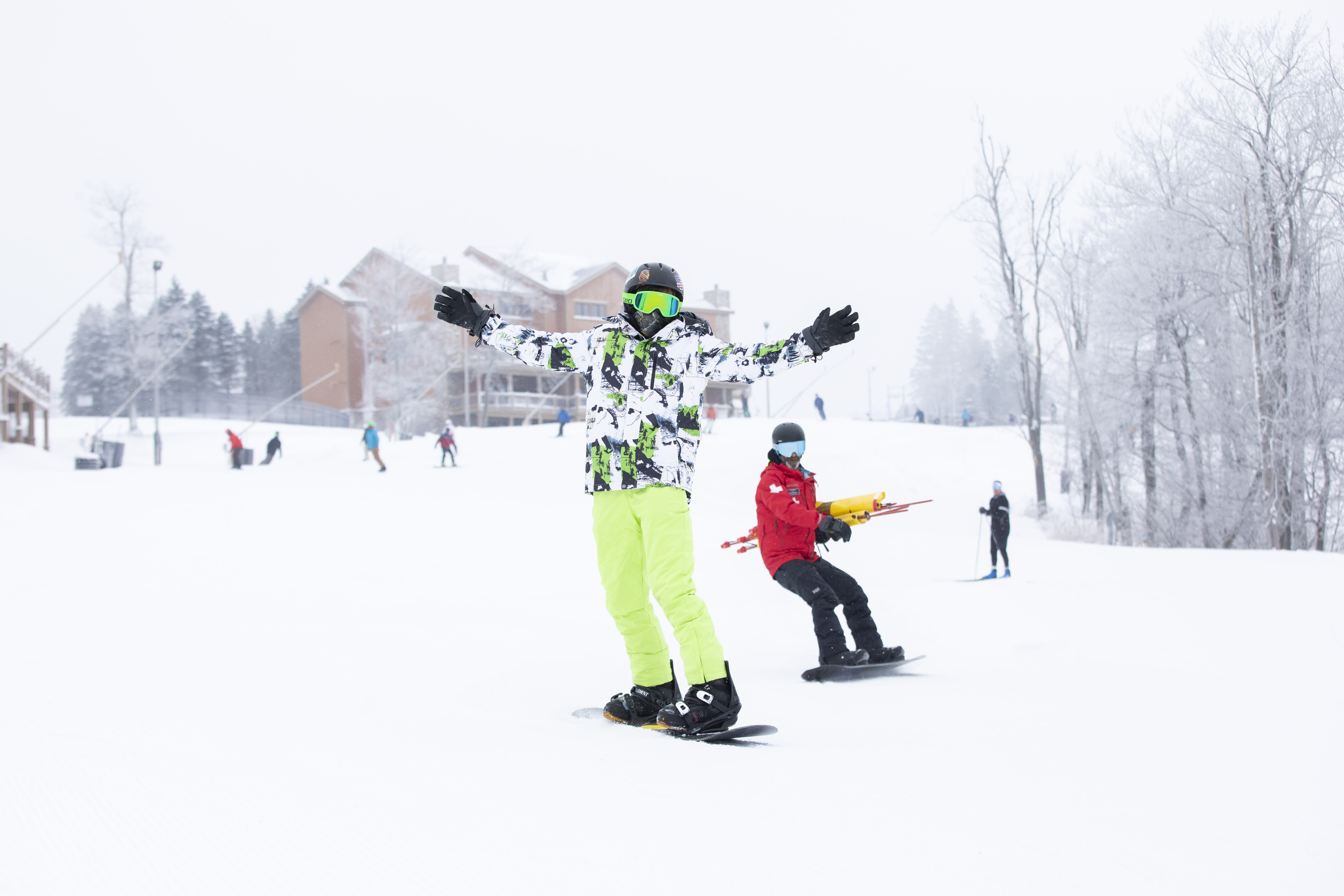 Snowboarders enjoy an early run at Seven Springs Mountain Resort on Friday, Dec. 6, 2024.
