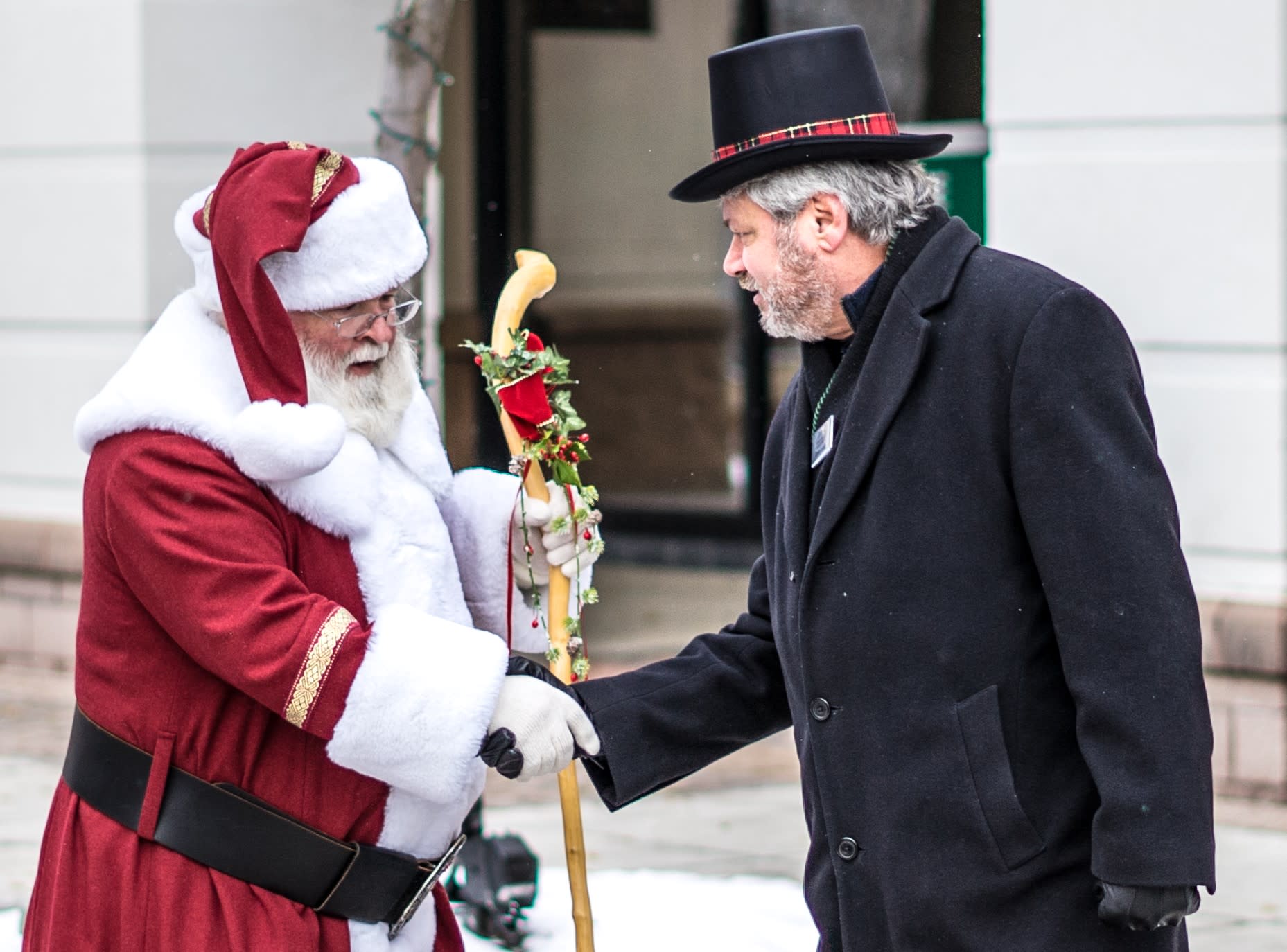 Dave Looby shaking hands with Santa Claus