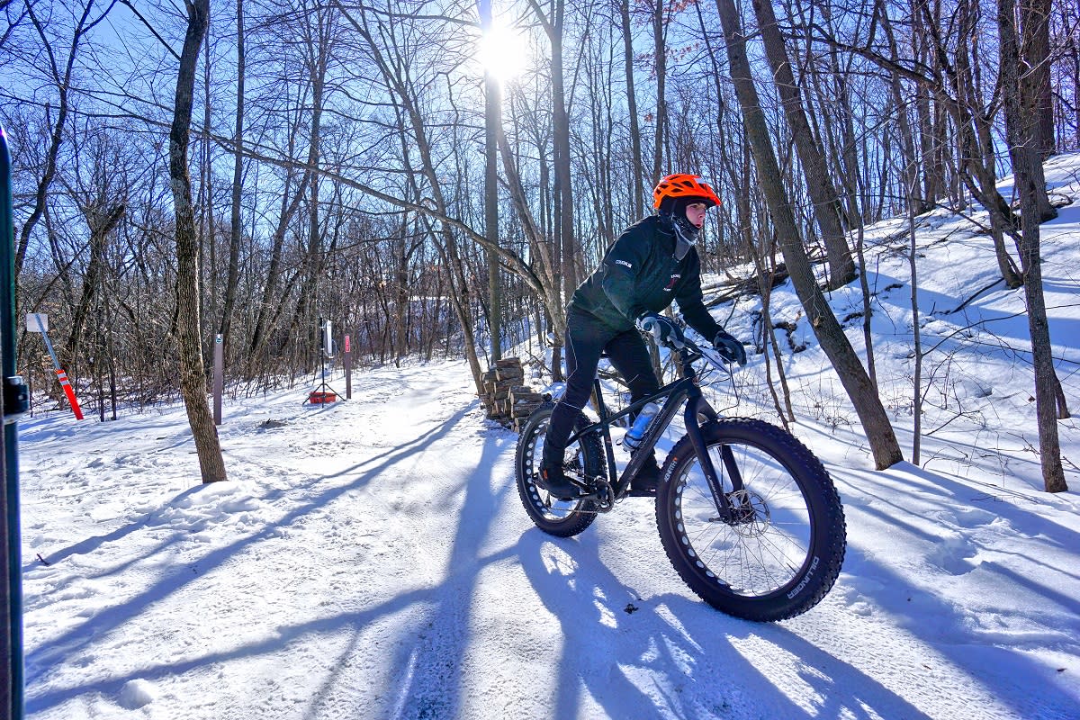 Woman fat biking in a race