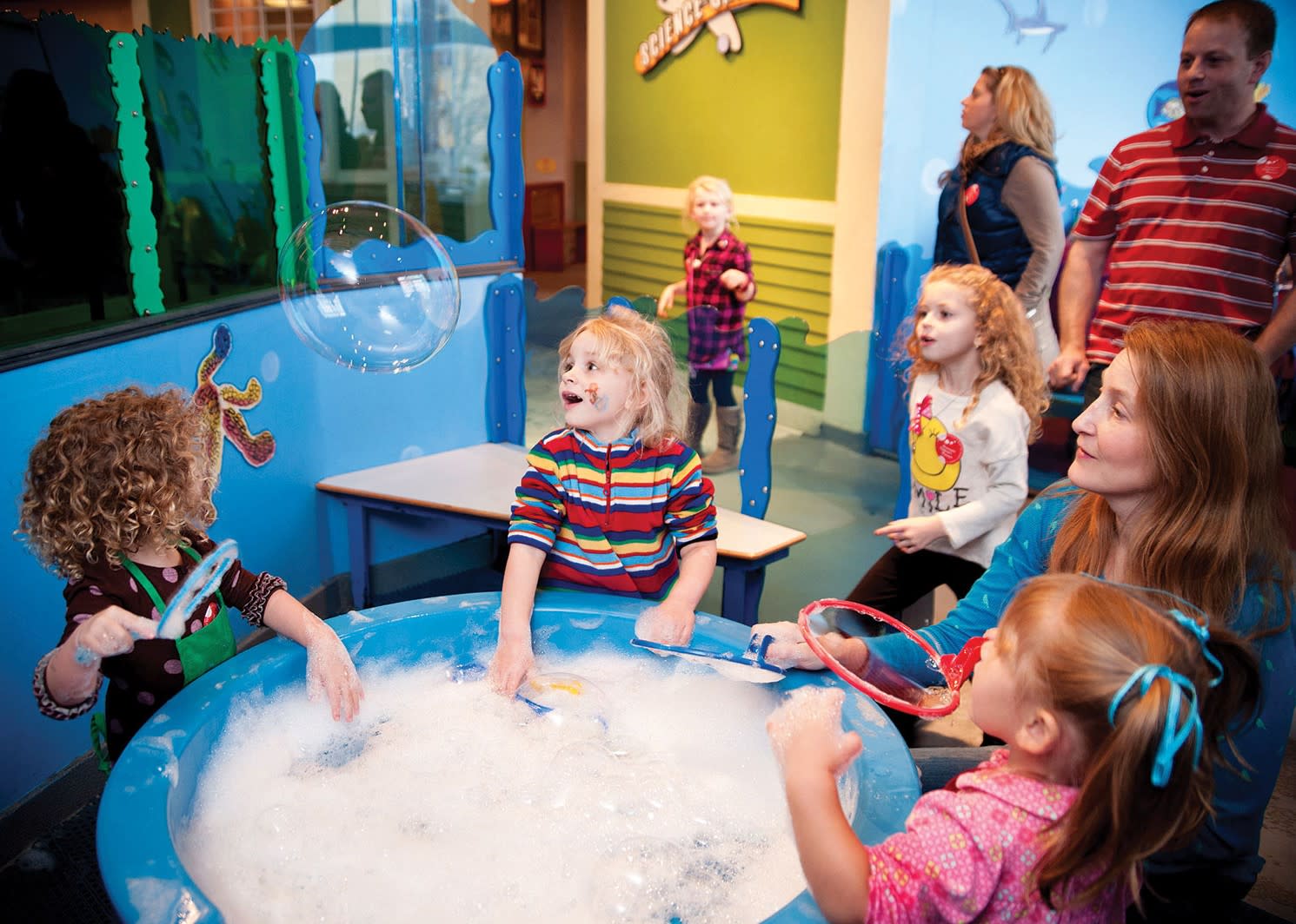 Kids playing with bubbles