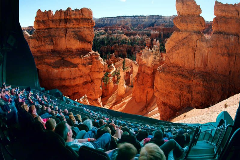 A panoramic scene of a natural park plays on the screen of the Science Museum of Minnesota