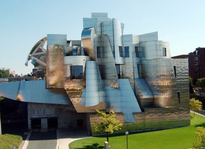 Light reflects of the metal exterior of the Weisman Art Museum