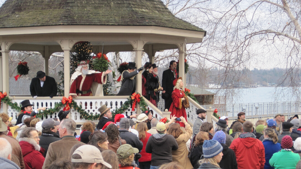 Santa and others in a gazebo for A Dickens Christmas celebration in Skaneateles