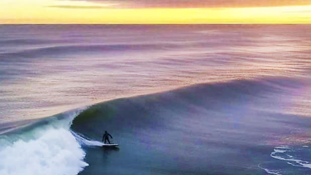 Surfing on Long beach Credit: Eric Schwab