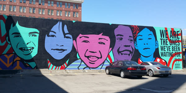 Kids faces mural on Telegraph and 20th in Oakland CA