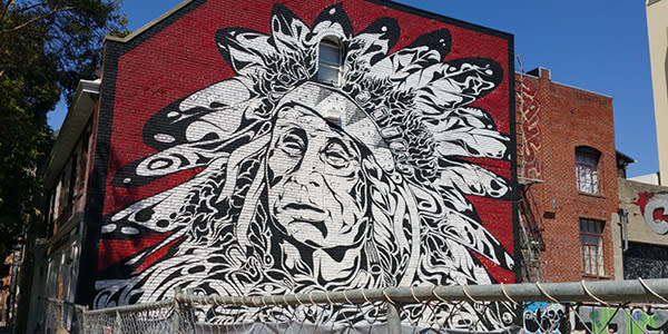 Native American chief street mural in Oakland CA at 15th and Webster