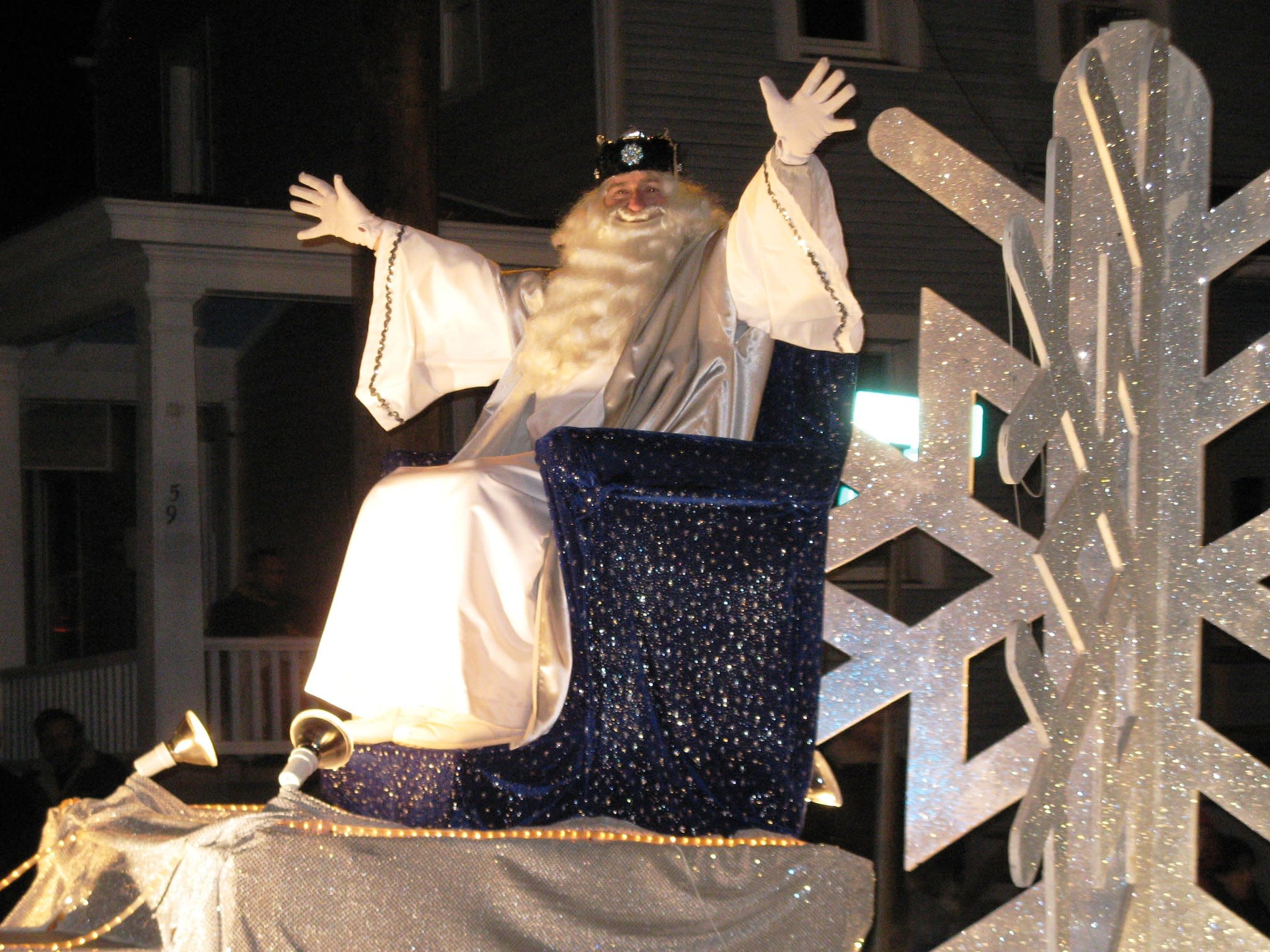 King Frost, aka Santa in all white sits on a thrown of blue with sparkling stars.  He is the last float in the King Frost Parade each year in Hamburg, PA