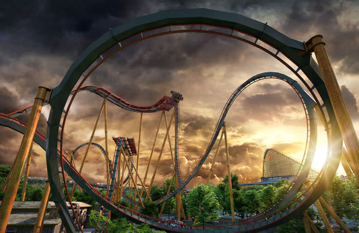 Rollercoaster with clouds and sunset
