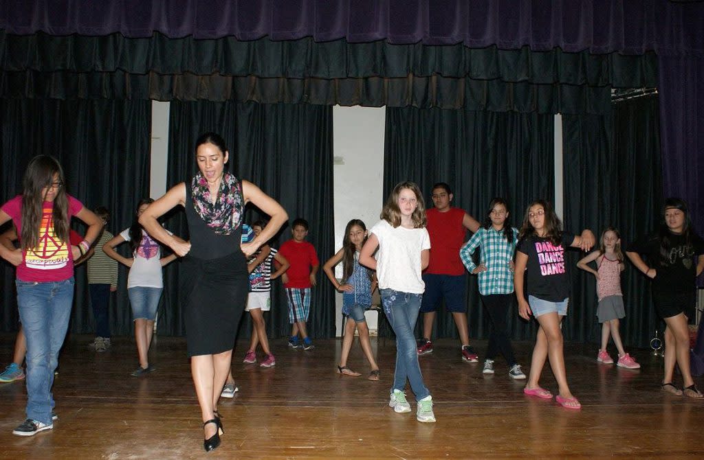 Kids can learn the Spanish dance and percussion of Flamenco at Entreflamenco. (Photo courtesy of Entreflamenco)