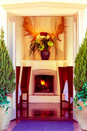 There’s a seat for you by the fireplace if you head for Santa Fe Restaurant Week. (Photo credit: Geronimo)