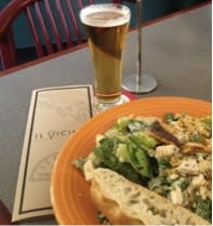 A hearty Caesar salad at Il Vicino lets you save the calories for a cool craft beer!