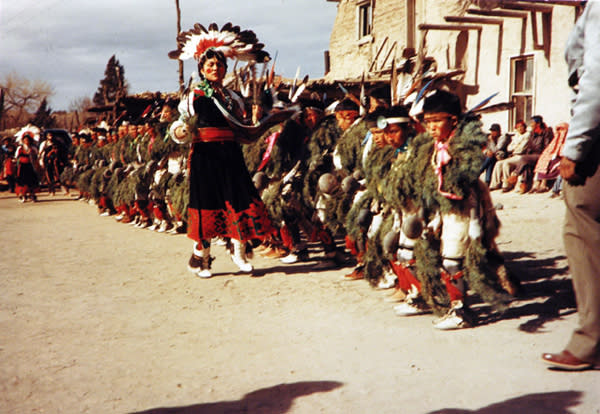 Members of The Tesuque Pueblo perform their Turtle Dance. (Photo courtesy of The New Mexico Art Museum)