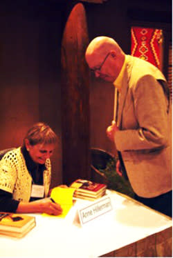 Talking books is serious business at the Tony Hillerman Writers' Conference. Anne Hillerman, Tony's daughter and cofounder of WORDHARVEST, signed books at a recent conference.