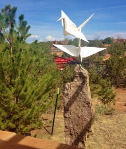 Cranes come to life in the Santa Fe Botanical Garden.