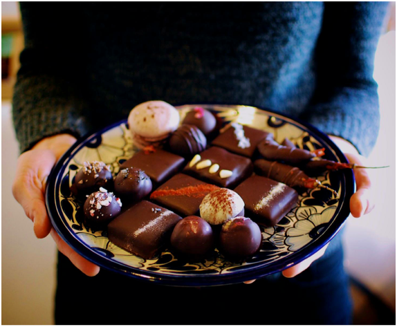 Yes, you’re seeing right–––those ARE chocolate covered ancho chiles on that plate! (Photo Credit: Kakawa Chocolate House)