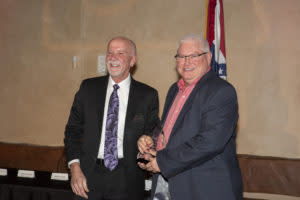Don Patty (right) accepts the Ambassador Award on behalf of Premier Baseball.