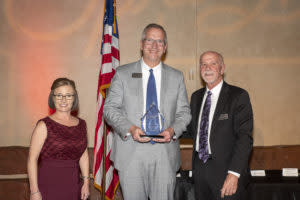 Brian Weiler (center) received the Diplomat Award.