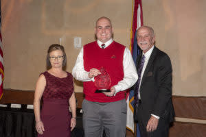 Dan Reiter (center) accepted the Hospitality Award on behalf of the Springfield Cardinals.