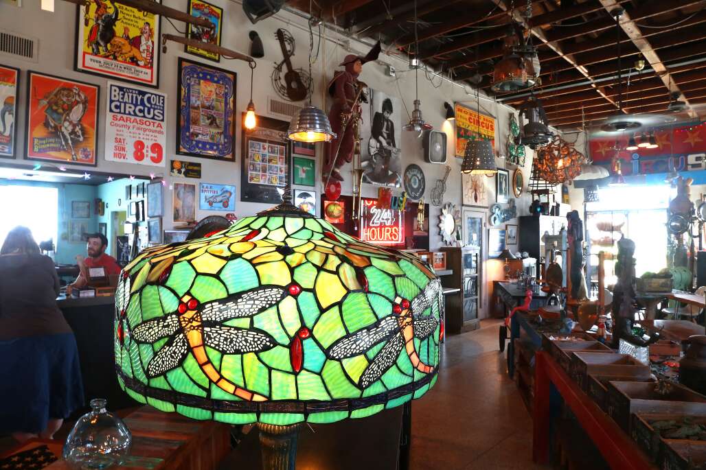 A display shows unique items, including a Tiffany-style lamp, at Circus City Architectural Salvage in Sarasota. 