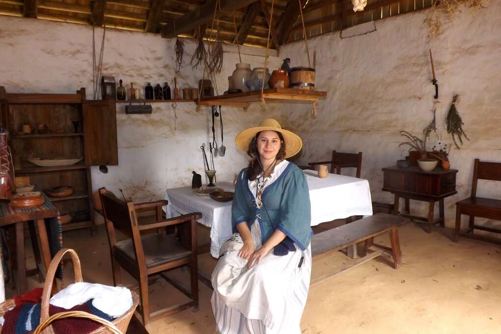 Character guide Beatrice Murray, portraying a Spanish lady, greets visitors in the reconstructed Spanish House.