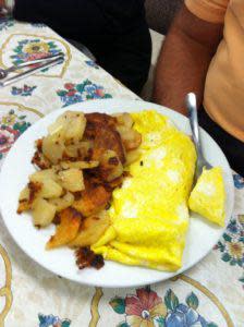 Omelet and fried potatoes