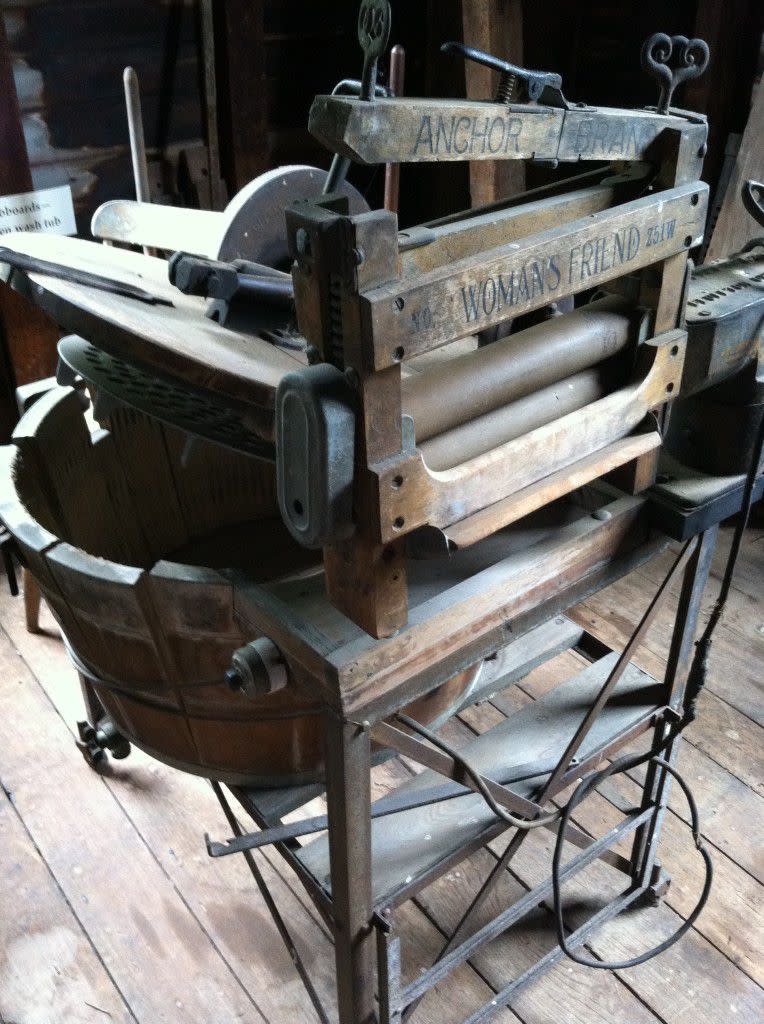 Check out this old fashioned washing machine...Note is called "Womans Friend"