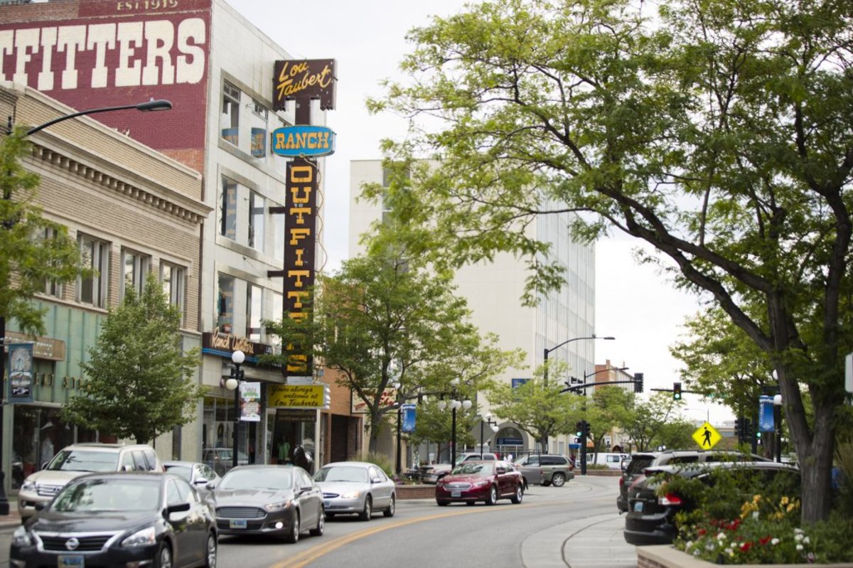 cars driving along downtown Casper, a Wyoming getaway city. 