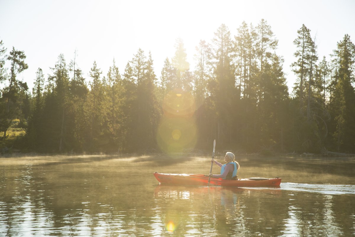 Kayaker paddling on Jackson Lake