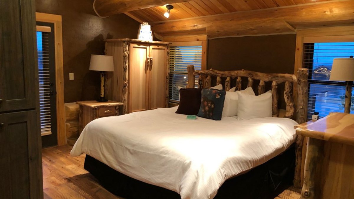 A cozy and rustic hotel room at the Kodiak Mountain Resort is just one of many things to do in Star Valley, WY.