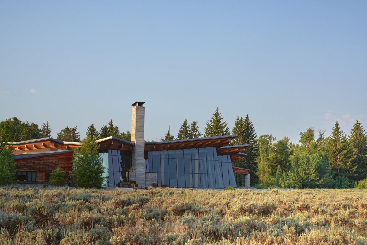 Visitor center surrounded by trees.