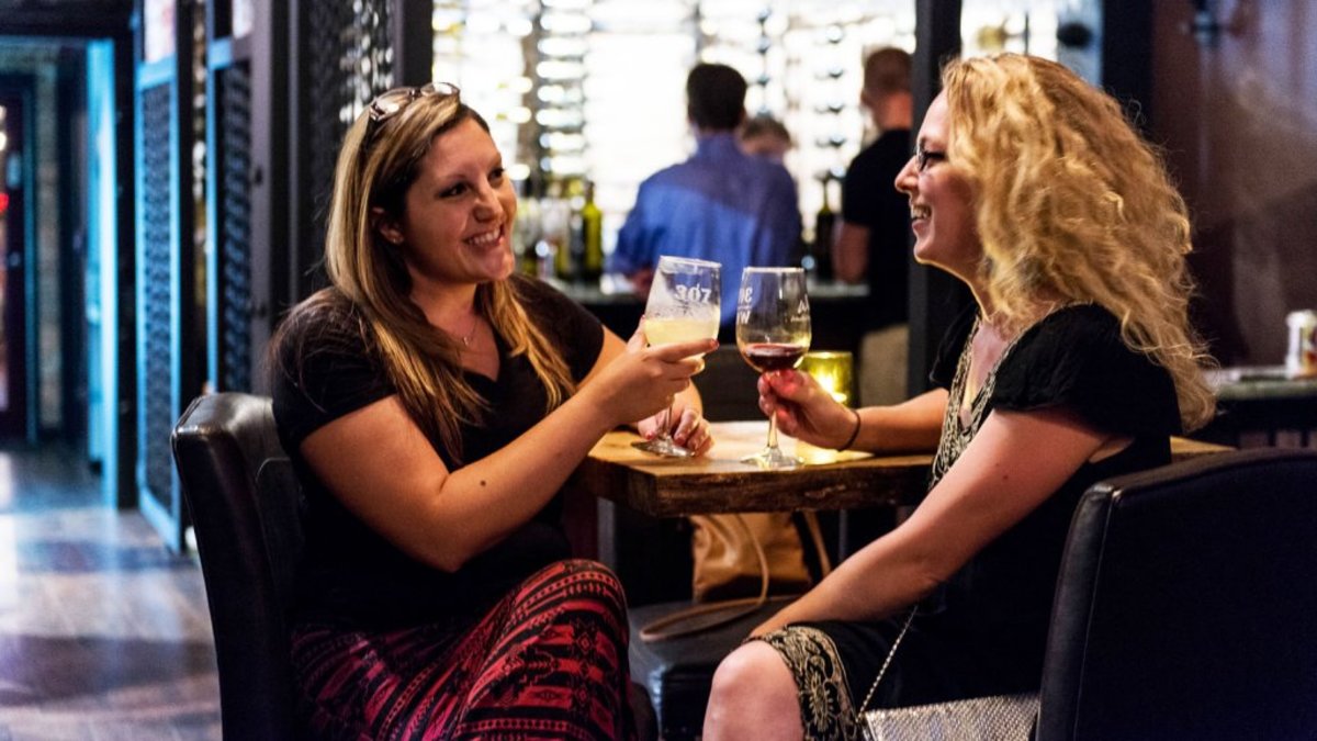 Visitors enjoy glasses of wine at Weston Wineries in Sheridan, WY.