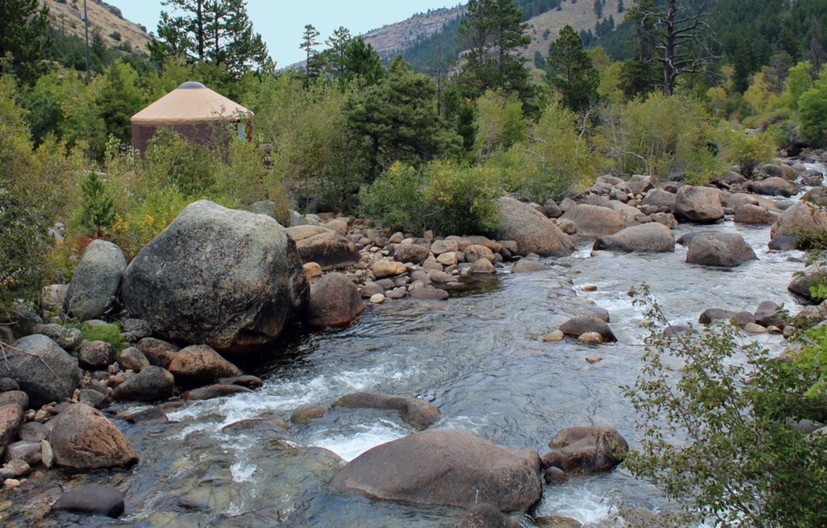 A campsite behind a river in the Wind River Range