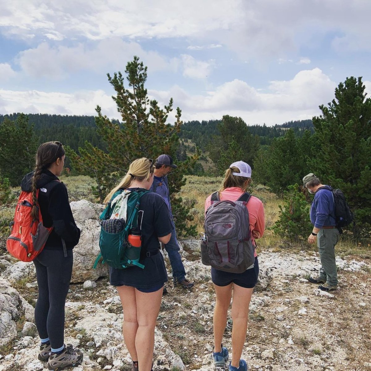 A group of hikers in Eadsville, a ghost town in Wyoming. 