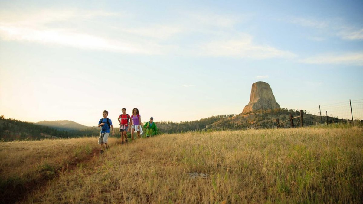 Family hiking at Devils Tower National Monument.