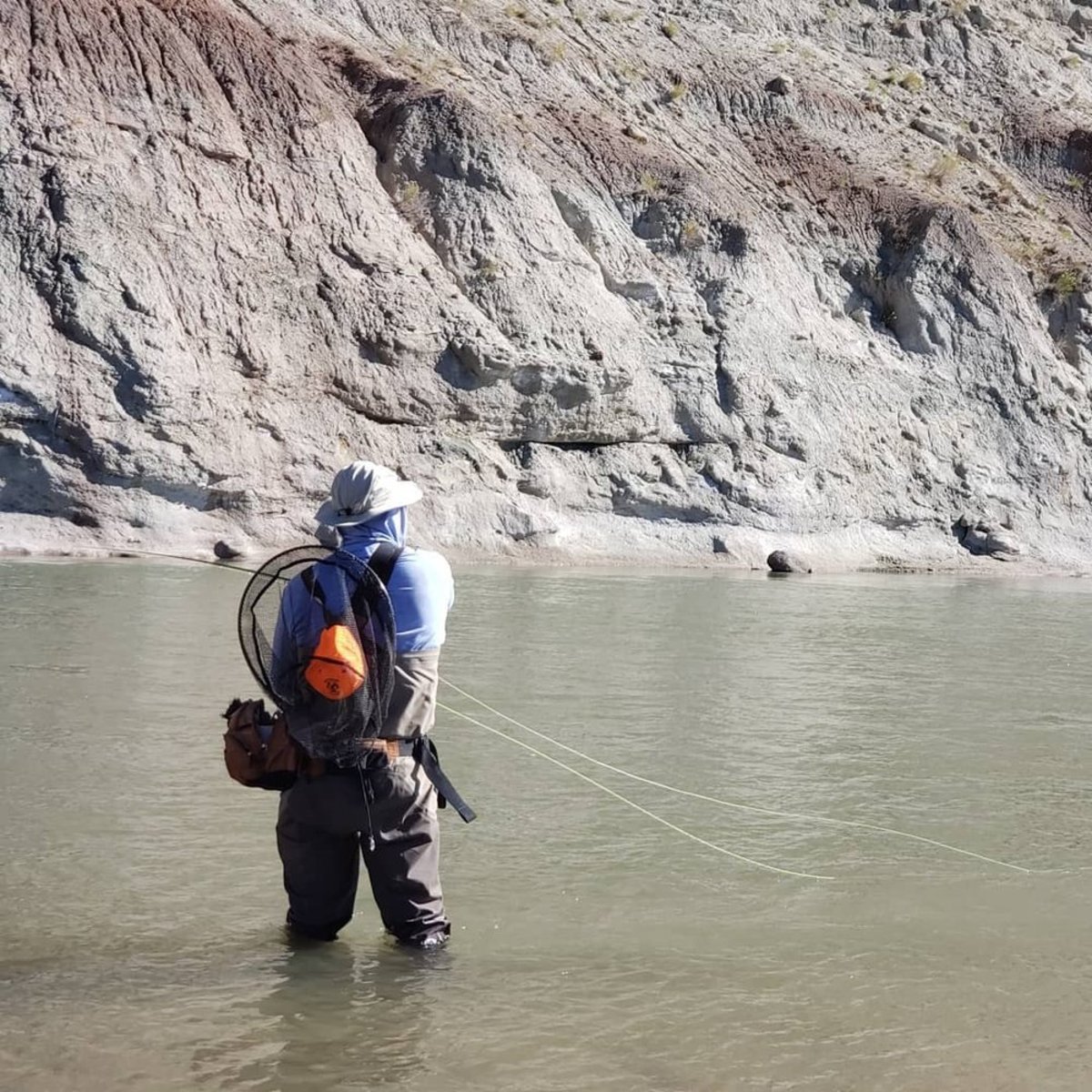 A man fly fishing in the Wind River Range 
