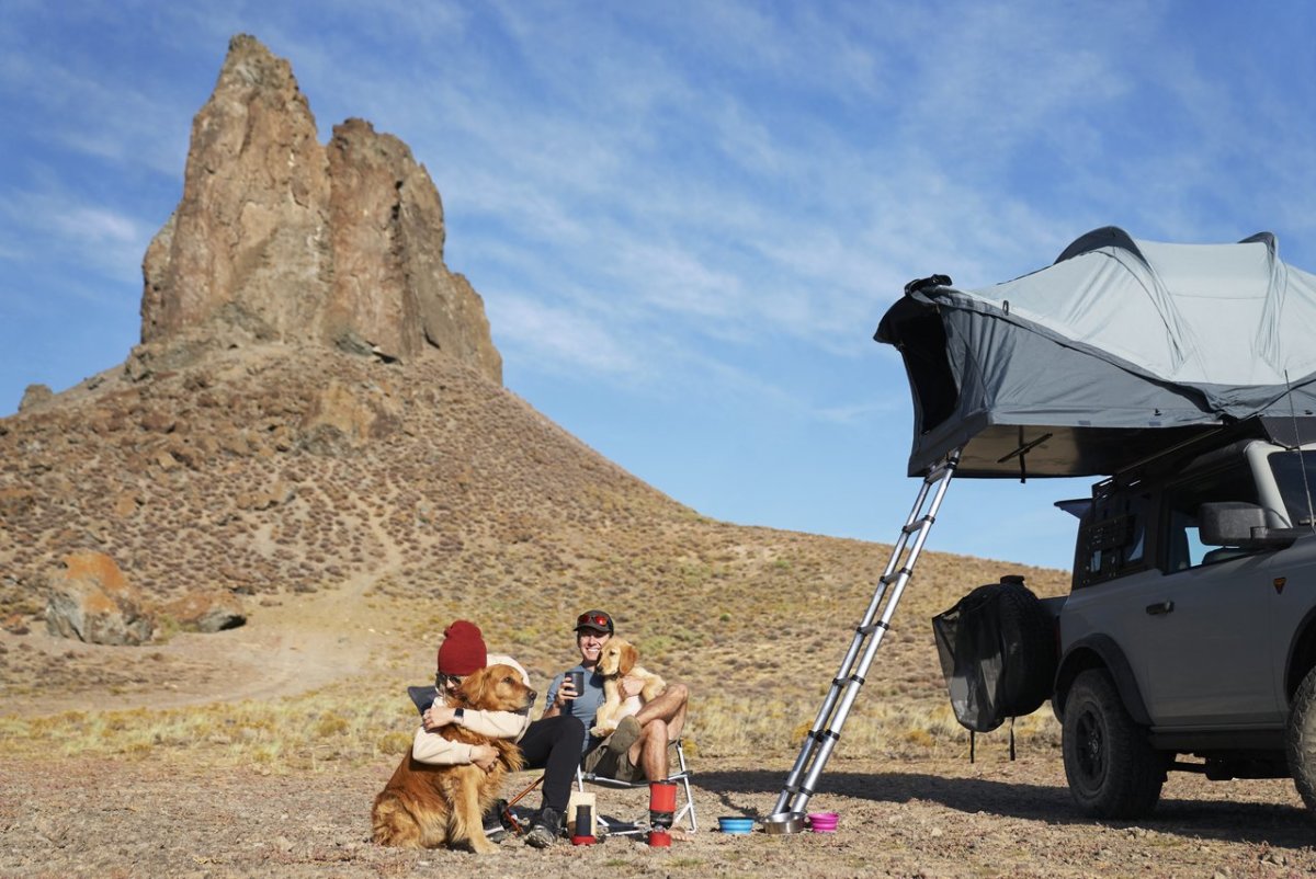 Couple with dogs enjoying the outdoors near Flaming Gorge