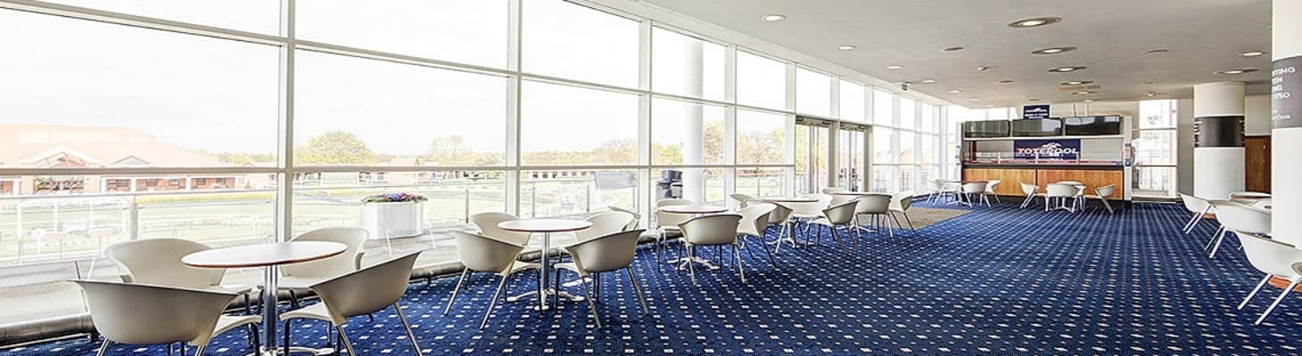 Located on the 1st floor, this dual aspect area is light and airy with a sweeping central staircase and has magnificent views over the Parade Ring and racecourse.

It adjoins Exhibition Hall 4 via the lift lobby and is ideal for:

Exhibitions
Refreshments for larger conferences
Registration space
Networking events
Drinks receptions
Entertainment area when using Exhibition Hall 1 for dining