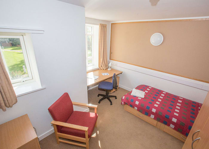 Look into a single bedroom in the Brian Heap Building.