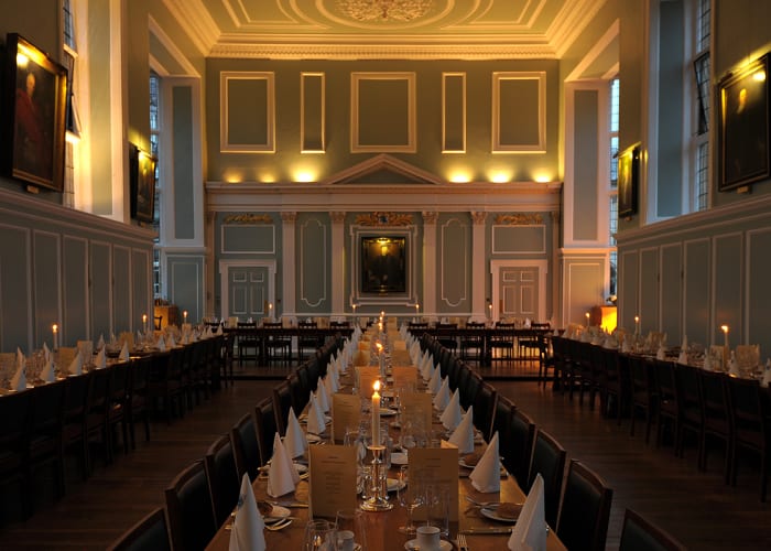 The Hall at Emmanuel College by candlelight, a perfect setting for private dining in Cambridge.