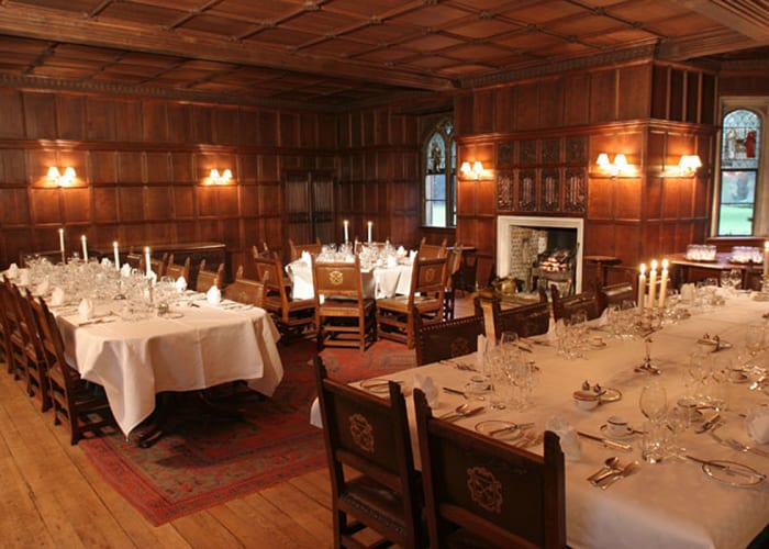 Fully wood-panelled walls with stunning tall stained glass windows and tiles framing the open fireplaces. Overlooking Fellows' Garden. Set for dining with candlelight. Ideal for exclusive dinners and receptions.