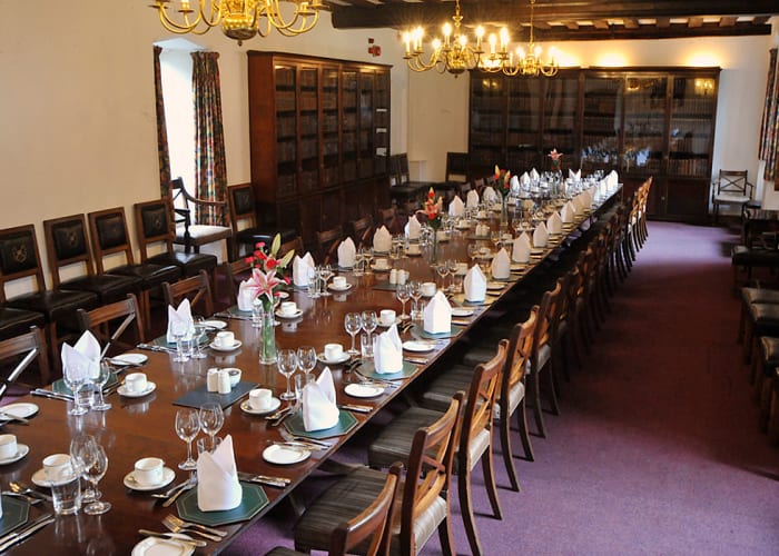 Set for a small private dining event the beamed Munro Room is located within Old Court at Queensâ€™ College.