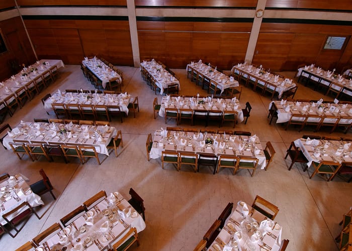 Cripps Hall from a birds eye view and set for dinner, the large dining hall is available out of term time for dinners, balls and parties.