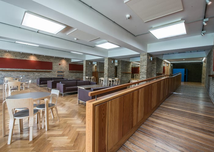 Although recently refurbished in 2011, the original exposed brick surfaces and grid-beamed ceilings of the Grade II* listed Harvey Court building have been left intact. Within this setting, the Harvey Court JCR provides an opportunity for a less formal meetings and is ideal for group discussions. Split over two levels and with the possibility of using room dividers, it also has the flexibility to hold a main meeting with smaller break out groups on the upper level. (Available during vacation periods only.)